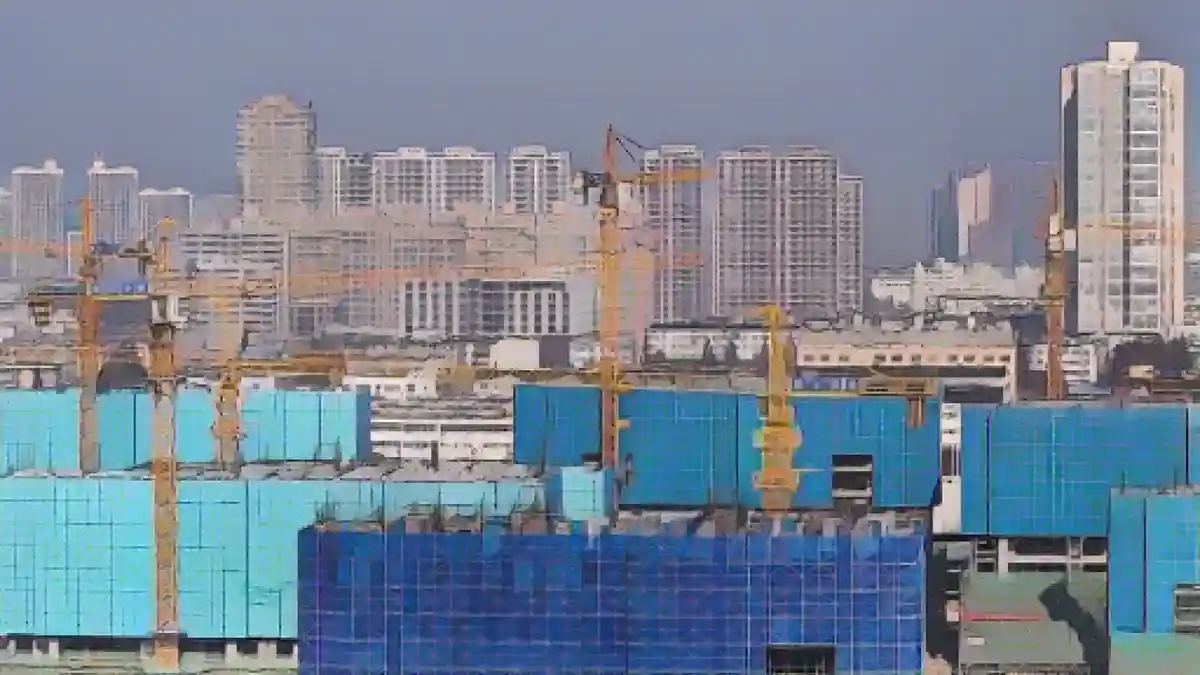 Аэрофотоснимок показывает строящееся здание недвижимости в городском районе города Хуайань, провинция Цзянсу, Китай, 5 декабря 2023 года.:Строящееся здание в городе Хуайань, провинция Цзянсу, 5 декабря 2023 года.