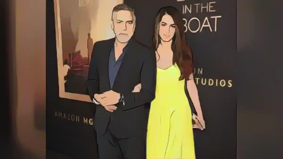 Джордж и Амаль Клуни на премьере своего нового фильма "Парни в лодке".:Джордж и Амаль Клуни на премьере своего нового фильма "Парни в лодке".