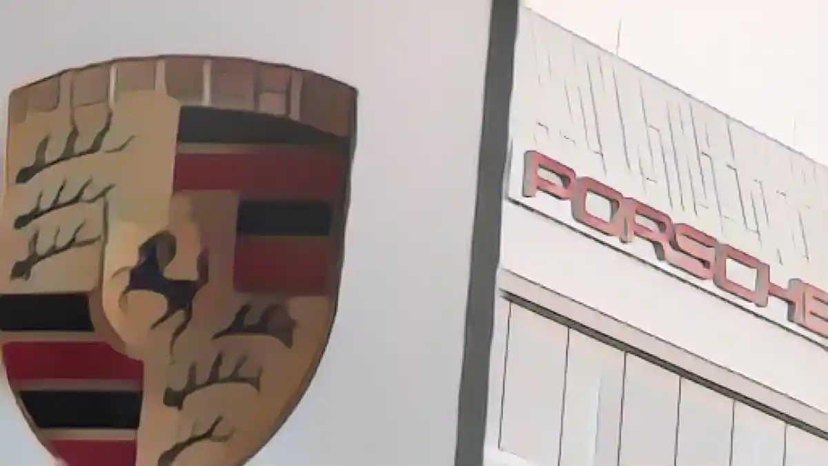 Надпись "Porsche" стоит за логотипом компании на территории Цуффенхаузена.:Надпись "Porsche" стоит за логотипом компании на заводе в Цуффенхаузене. Фото