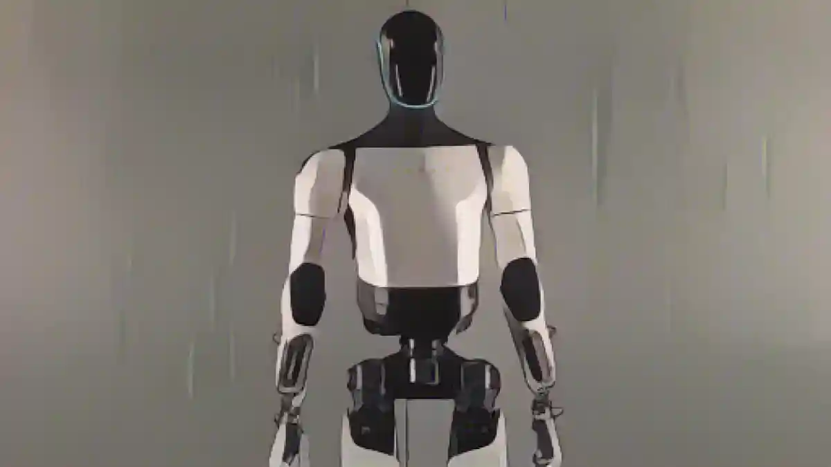 Робот Tesla Optimu:Помимо автомобилей, систем хранения энергии, черепицы и зарядных станций, Tesla также работает над созданием человекоподобных роботов.