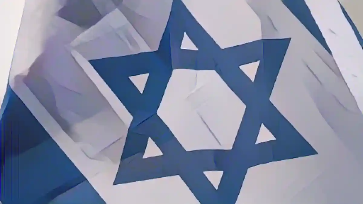 Израильский флаг развевается на ветру.:Израильский флаг развевается на ветру. Фото